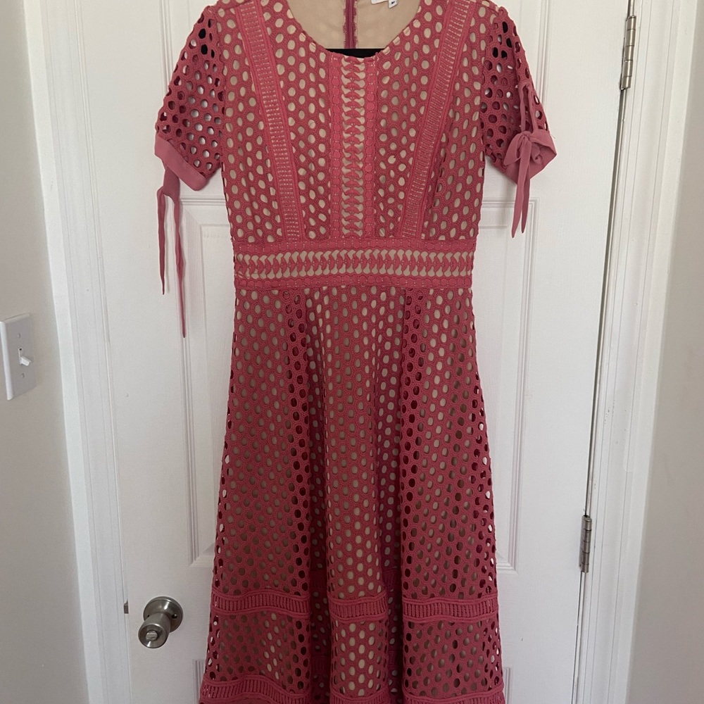 Dress size medium. Fully lined with crochet like overlay.